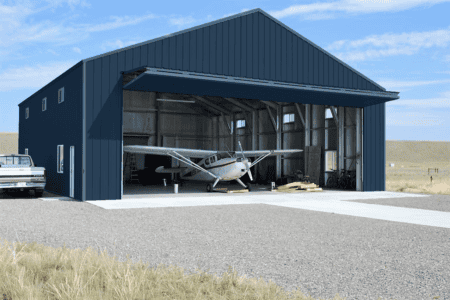 Blue Airplane Hanger with Bifold Door by Steel Commander Corp | USA American Made | 40 years experience