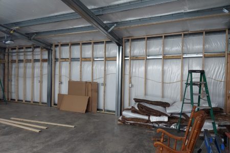 Interior of Insulated Steel Garage with Various Items