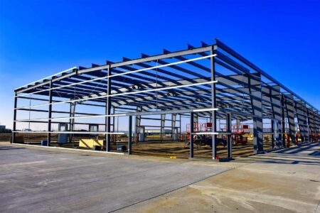 Steel agricultural building framework for farm storage and equipment. Steel Commander Corp logo — American prefab steel building manufacturer, Boca Raton, Florida