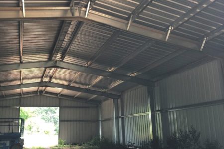 Interior view of a steel building with metal roof and walls, showcasing durable construction. Steel Building Kits for Sale Commercial, Garage & Residential | Steel Commander Corp