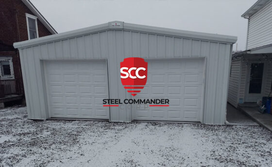 Metal building with Steel Commander logo, ideal for storage or workshop needs. Steel Building Kits for Sale — Commercial, Garage & Residential | Steel Commander Corp