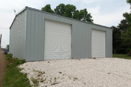 Aquamarine Two Car Steel Garage with White Roll- Up Doors