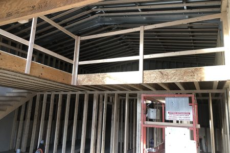 Loft Space Under Construction in Steel Home