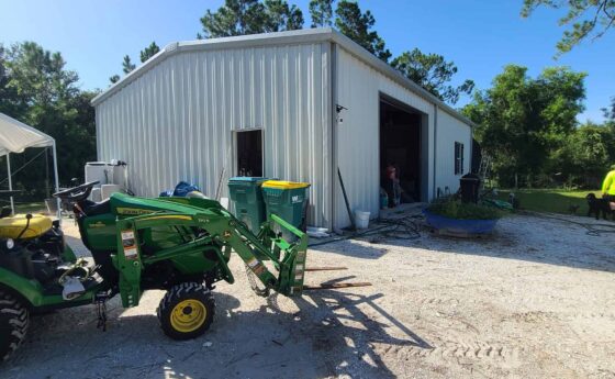 Metal garage building in Arizona for storage and vehicle protection.