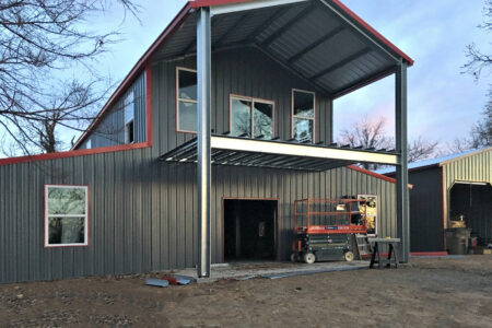 Two Story Steel Home with Second Story Patio Space