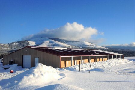 Steel USDO Dog Kennel in ID illustrating how our steel buildings can withstand heavy snow loads.