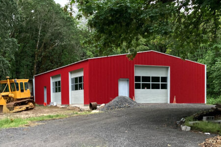 Red Steel Garage with Three Doorways
