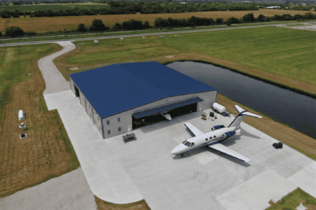 Blue airplane hangar Northern California by Steel Commander Corp