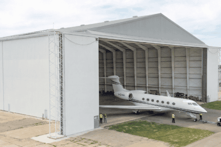 Large White Airplane Hangar Texas by Steel Commander Corp